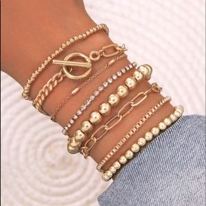 Gold colored bracelets